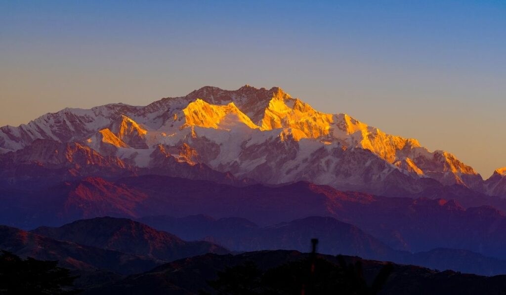 Goecha trek in sikkim, View of Kanchenjunga mountain from Goecha La with rhododendron forests.