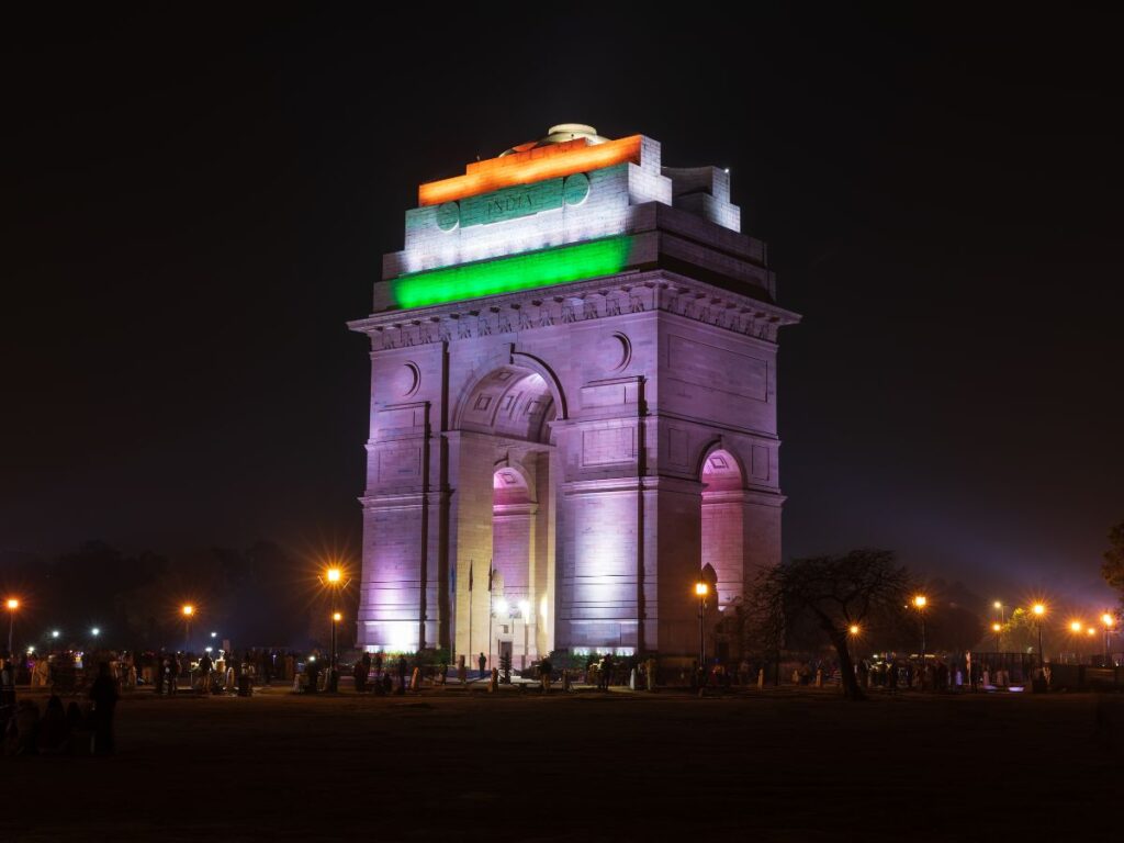 Visit India Gate to honor history, experience architecture, and enjoy beauty.