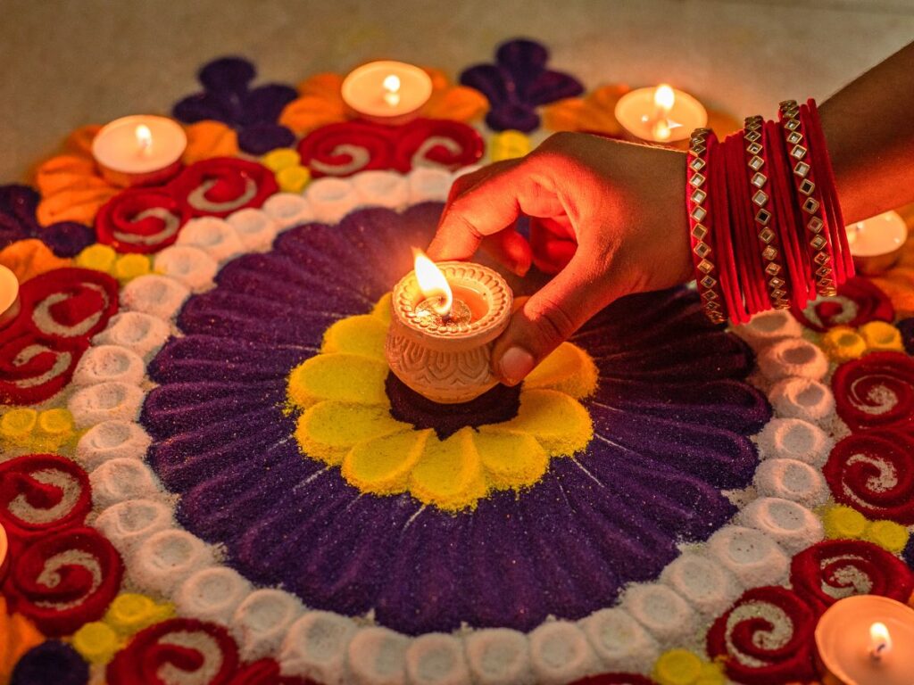 13 best ways to celebrate the Diwali festival; making rangoli