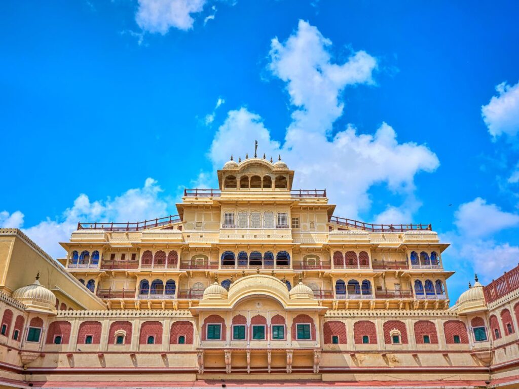 The magnificent City Palace, a marvel of Mewar architecture, nestled on the shores of Lake Pichola