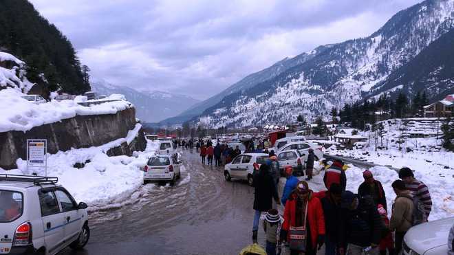 Tourists throng Nehru Kund - The Tribune