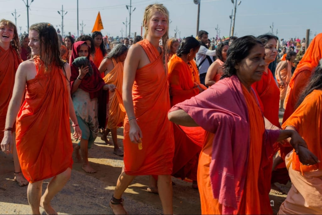 Devotees - traveling to - take - Shahi Snan - Amrit - Snan - at - Triveni - Sangam - in - Prayagraj